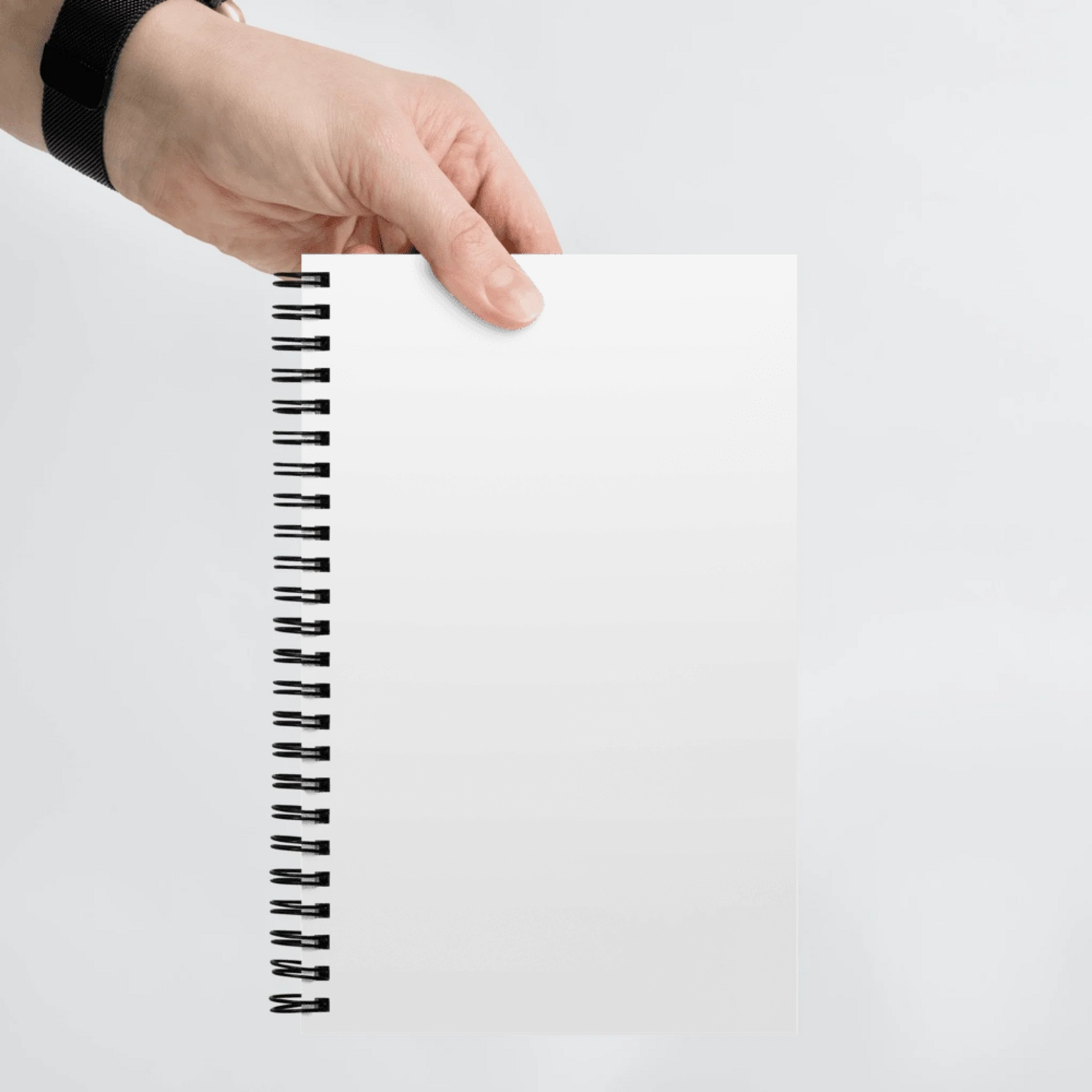 Close-up detail of custom photo print on spiral notebook — notebook surface texture