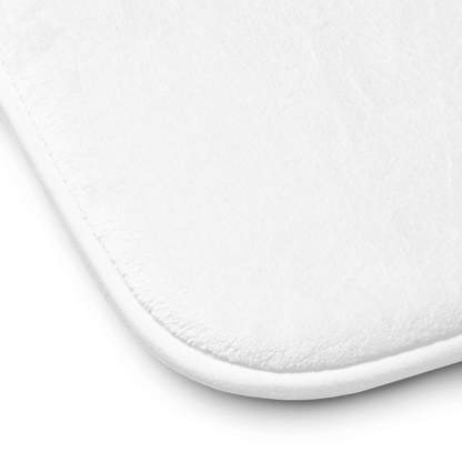 Lifestyle styling of personalized memory foam bath mat — bath accessory ready for daily use