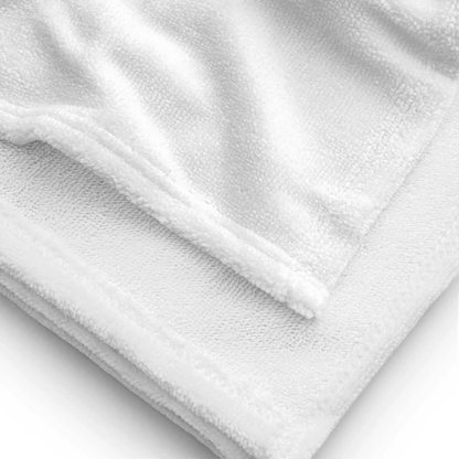 Lifestyle styling of personalized all-over beach towel — all-over print towel ready for daily use