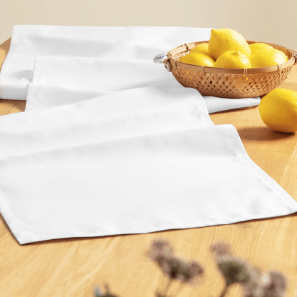 Detail texture macro of custom table runner — premium dining accessory finish
