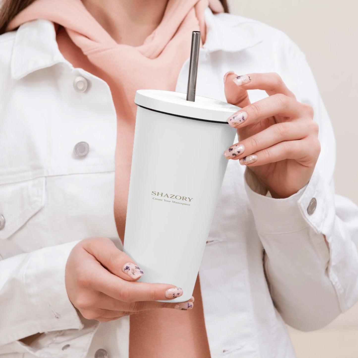 Lifestyle styling of personalized insulated tumbler with straw — tumbler ready for daily use