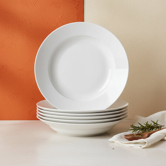 Shop a set of 6 white ceramic dinner plates with raised edges, smooth glaze, stackable design, and everyday table versatility. Free shipping.
