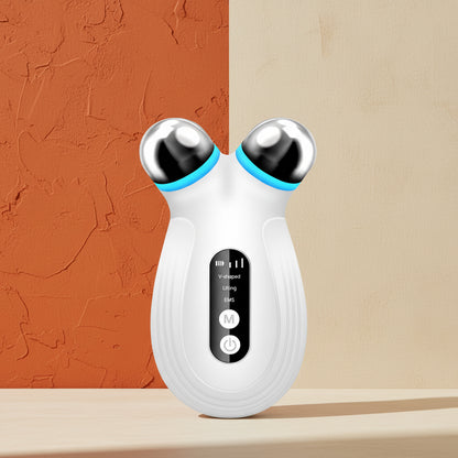 A product feature image of the Shazory microcurrent facial toning and LED beauty tool, demonstrating the V-shaped lifting and EMS modes for professional face sculpting and anti-aging, available at getshazory.com